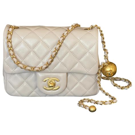 chanel blue 2021 classic mini square pearl crush flap bag|Chanel handbags.